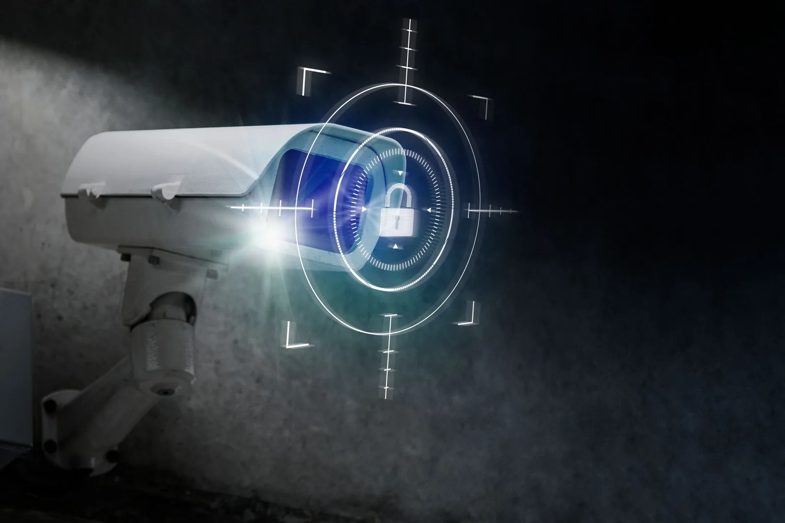 A commercial security camera covering an approach at night